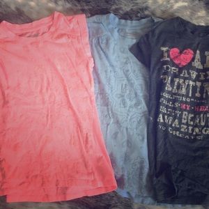 Three kids size shirts